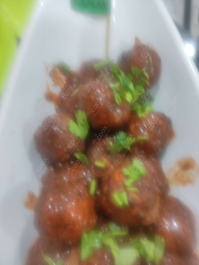 Delicious Veg Manchurian (Dry) prepared by COOX