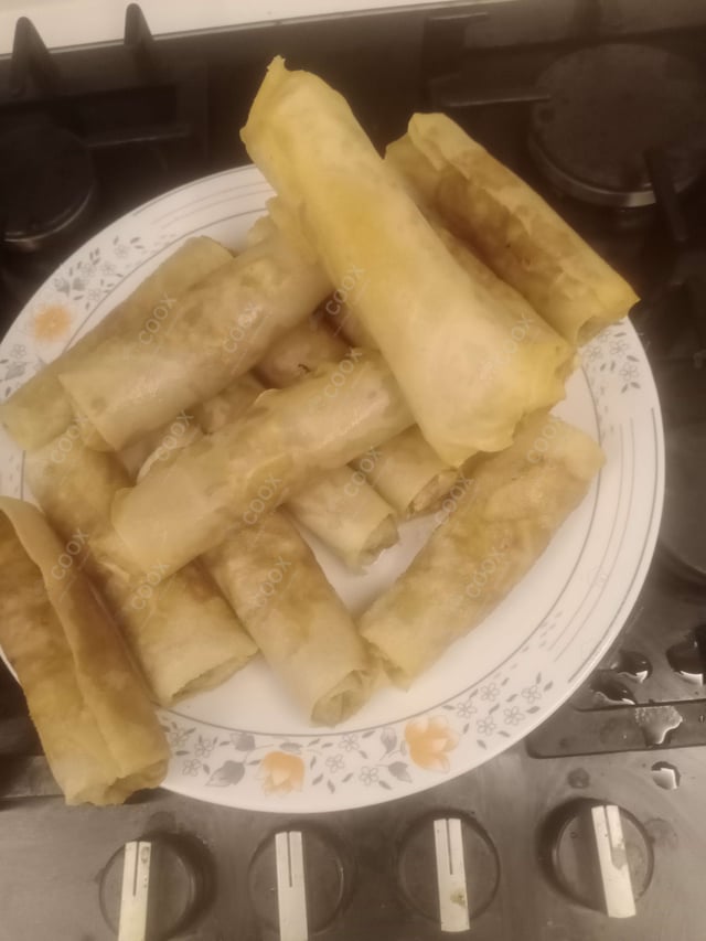 Delicious Veg Spring Rolls prepared by COOX