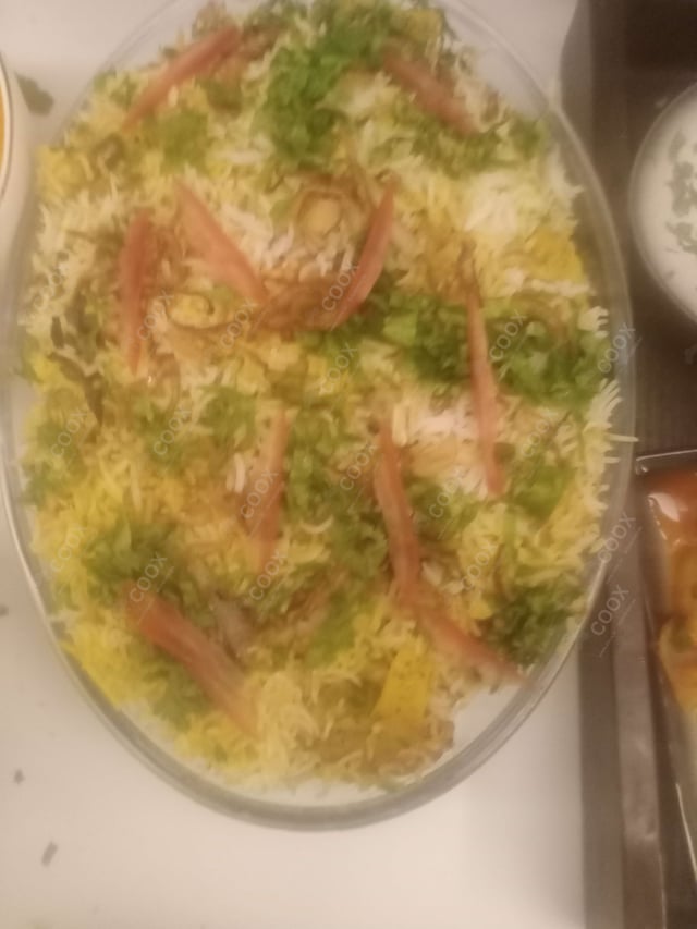 Delicious Veg Biryani prepared by COOX