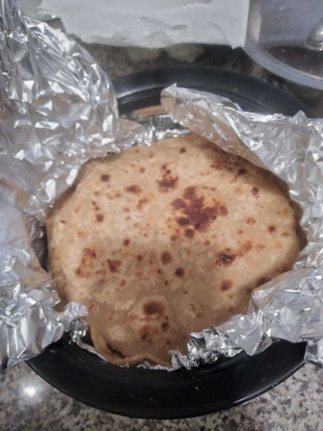 Delicious Lachha Parathas prepared by COOX