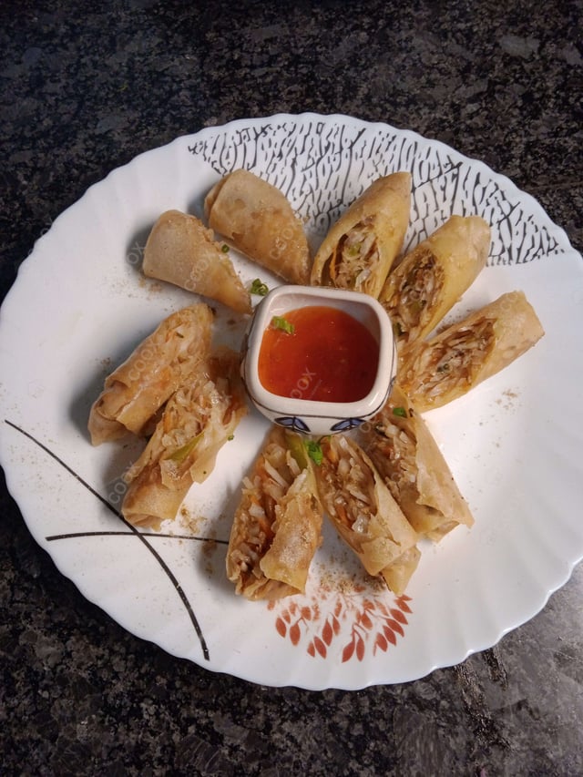 Delicious Veg Spring Rolls prepared by COOX