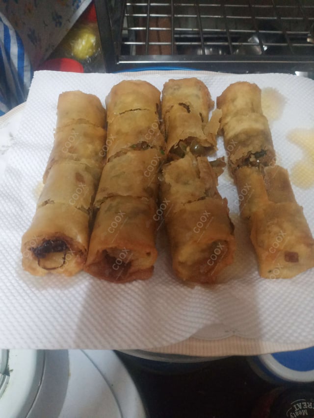 Delicious Veg Spring Rolls prepared by COOX