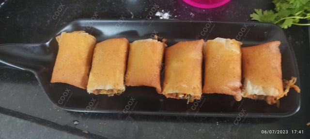 Delicious Veg Spring Rolls prepared by COOX