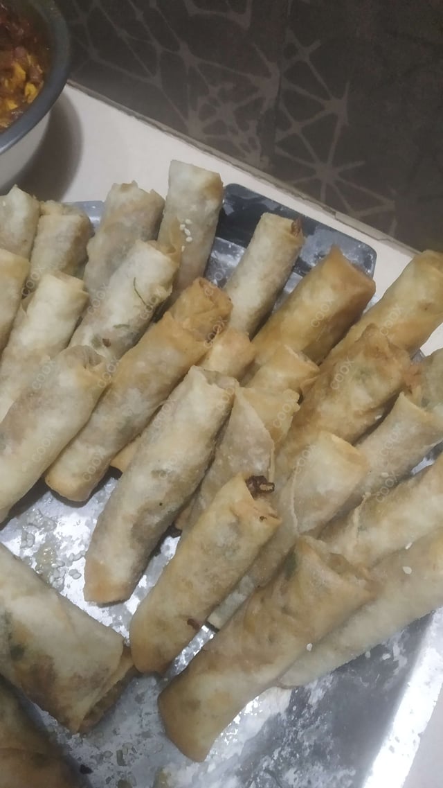 Delicious Veg Spring Rolls prepared by COOX