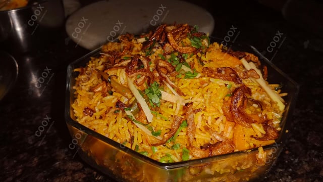 Delicious Veg Biryani prepared by COOX