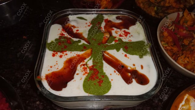 Delicious Dahi Bhalla prepared by COOX