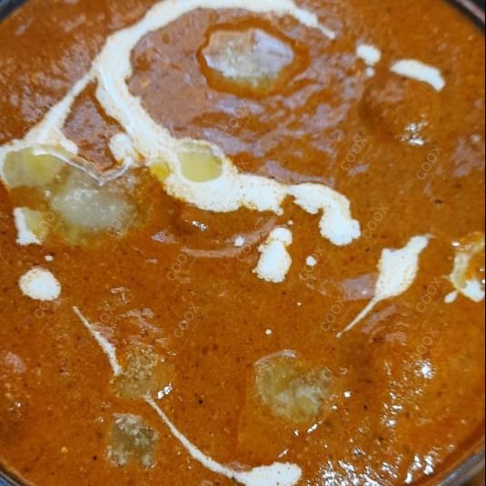 Delicious Paneer Butter Masala prepared by COOX