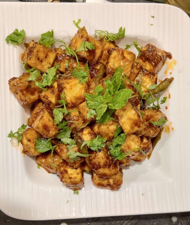 Delicious Chilli Paneer (Dry) prepared by COOX