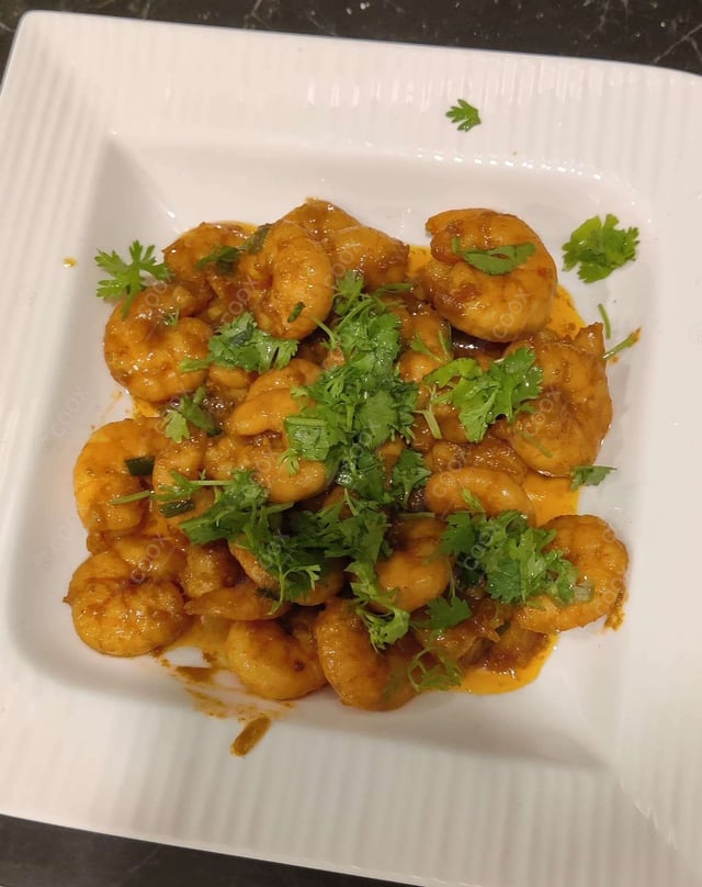 Delicious Butter Garlic Prawns prepared by COOX