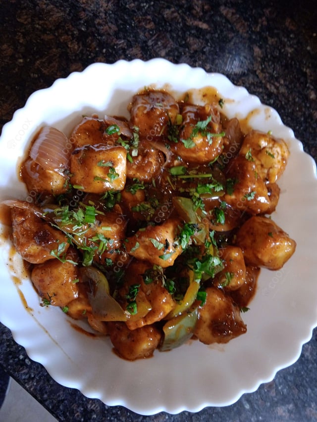 Delicious Chilli Paneer (Dry) prepared by COOX