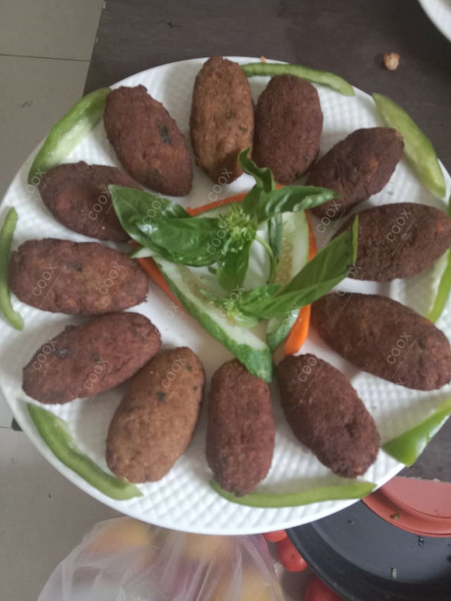 Delicious Mutton Seekh Kebab prepared by COOX