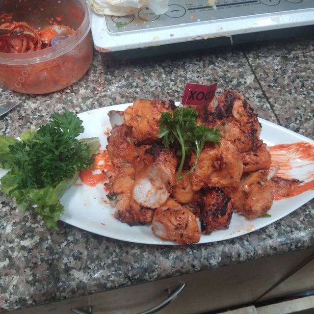 Delicious Fish Tikka prepared by COOX