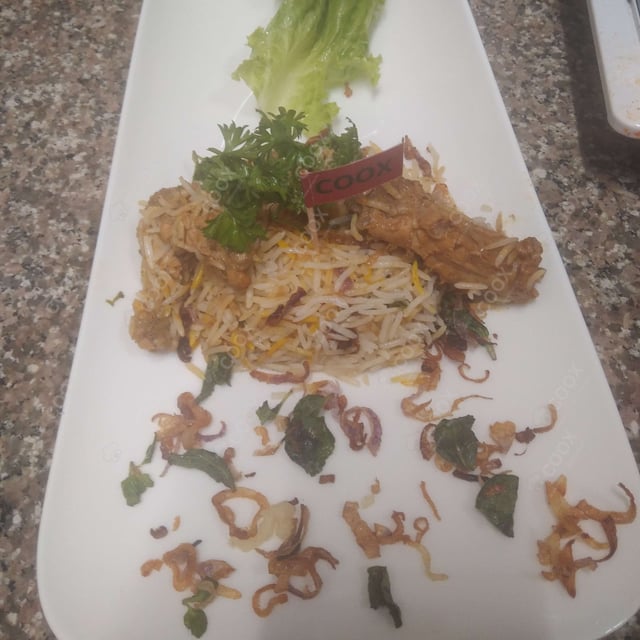 Delicious Chicken Biryani prepared by COOX