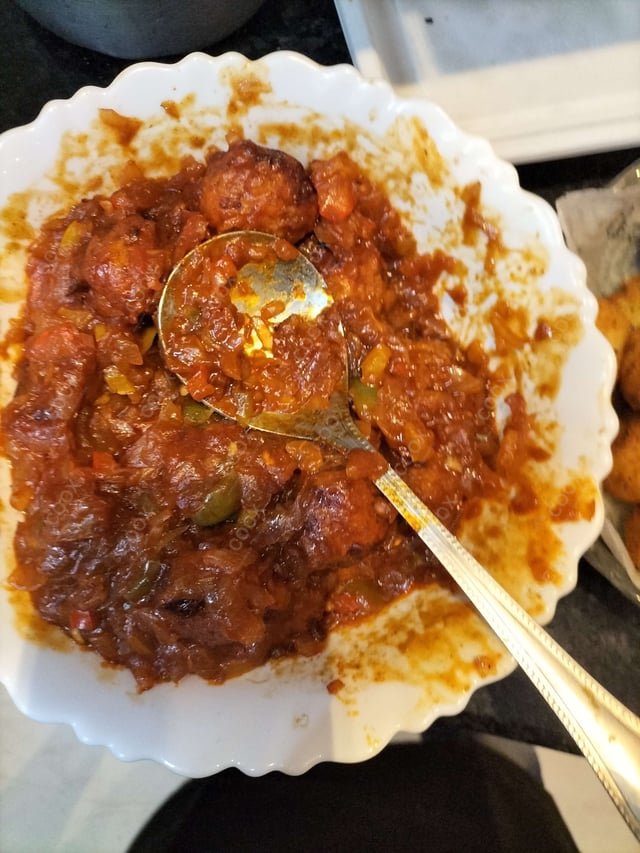 Delicious Veg Manchurian (Dry) prepared by COOX