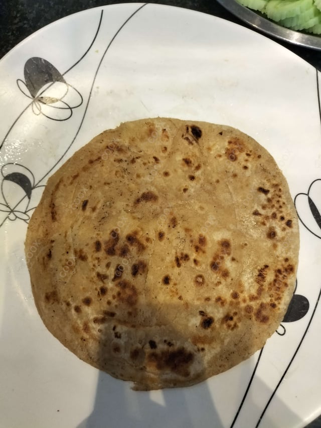 Delicious Lachha Paranthas & Rotis prepared by COOX