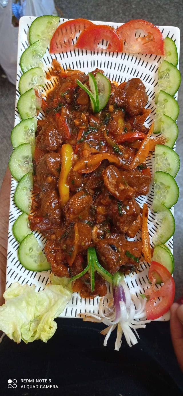 Delicious Crispy Chilli Lamb prepared by COOX