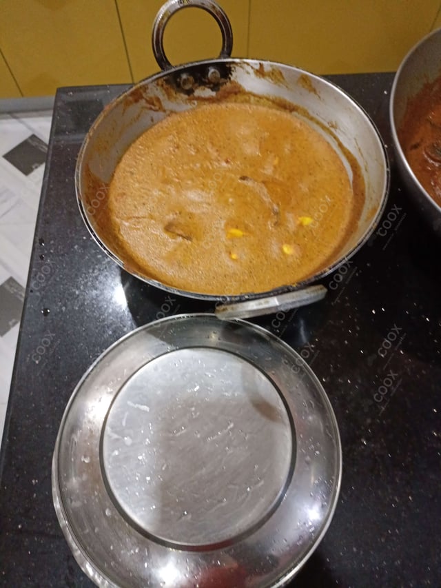 Delicious Dum Aloo prepared by COOX