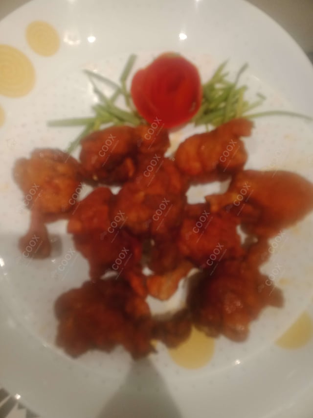 Delicious Chicken Lollipop prepared by COOX