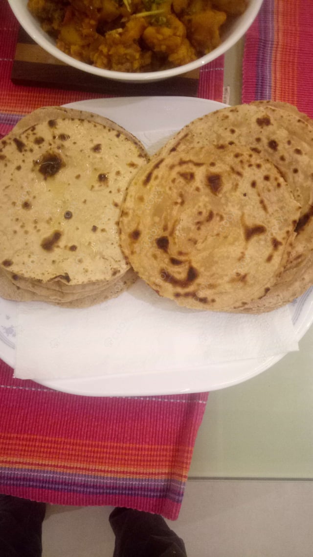 Delicious Lachha Paranthas & Rotis prepared by COOX