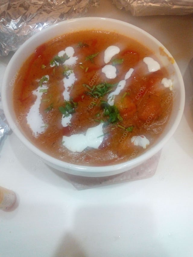 Delicious Dum Aloo prepared by COOX