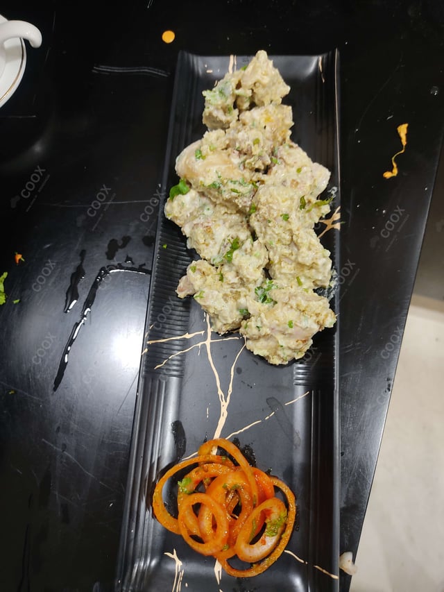 Delicious Murgh Malai Tikka prepared by COOX