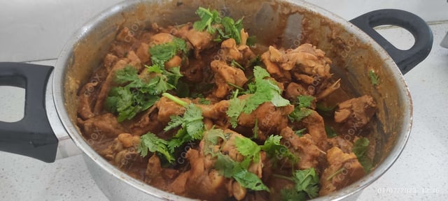 Delicious Kadhai Chicken prepared by COOX