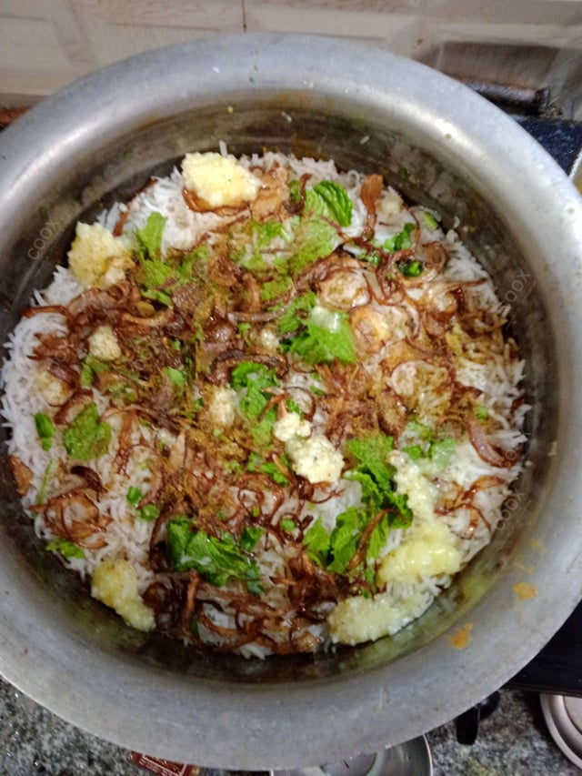 Delicious Veg Biryani prepared by COOX