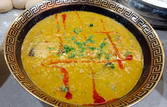 Delicious Dal Tadka prepared by COOX