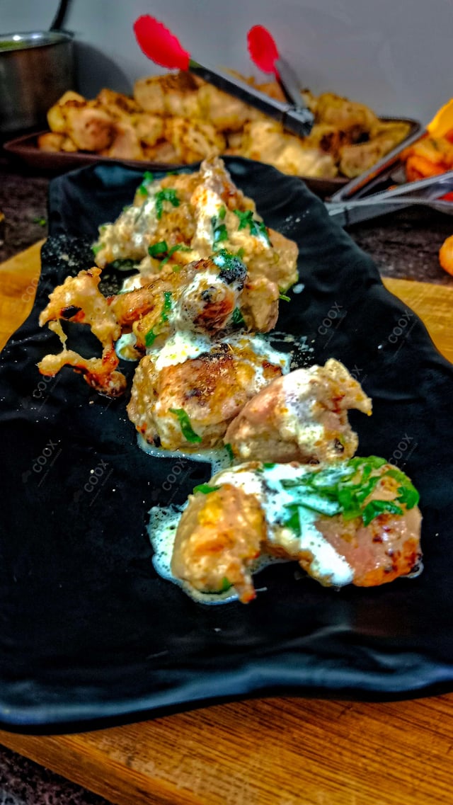 Delicious Murgh Malai Tikka prepared by COOX