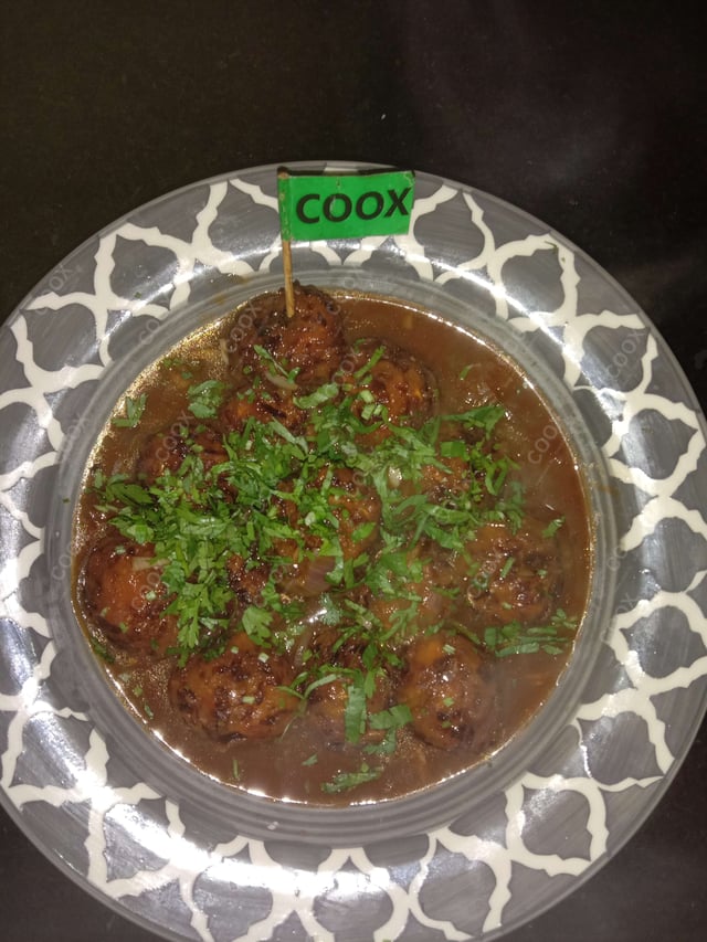 Delicious Veg Manchurian (Gravy) prepared by COOX