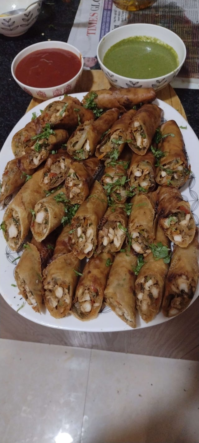 Delicious Chicken Spring Rolls prepared by COOX