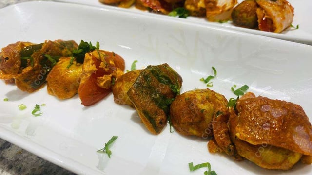 Delicious Mushroom Tikka prepared by COOX