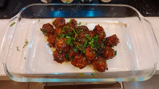 Delicious Veg Manchurian (Dry) prepared by COOX