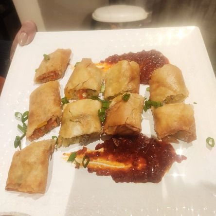 Delicious Veg Spring Rolls prepared by COOX