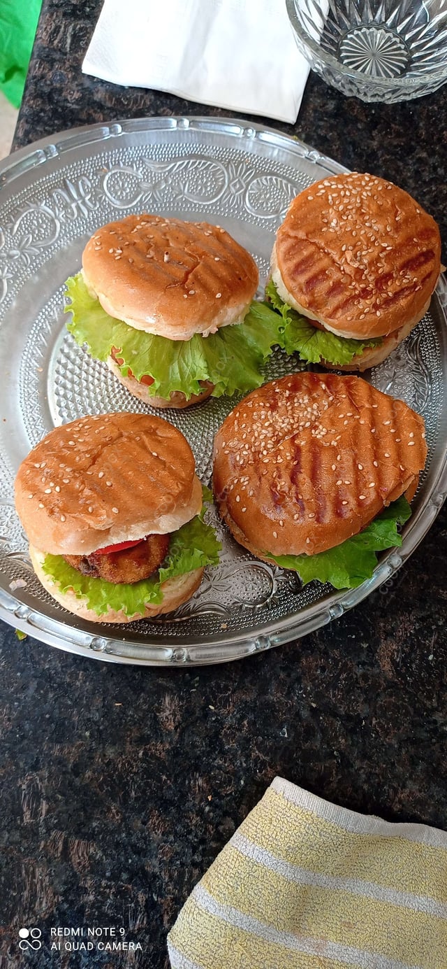 Delicious Mini Veg Burgers prepared by COOX