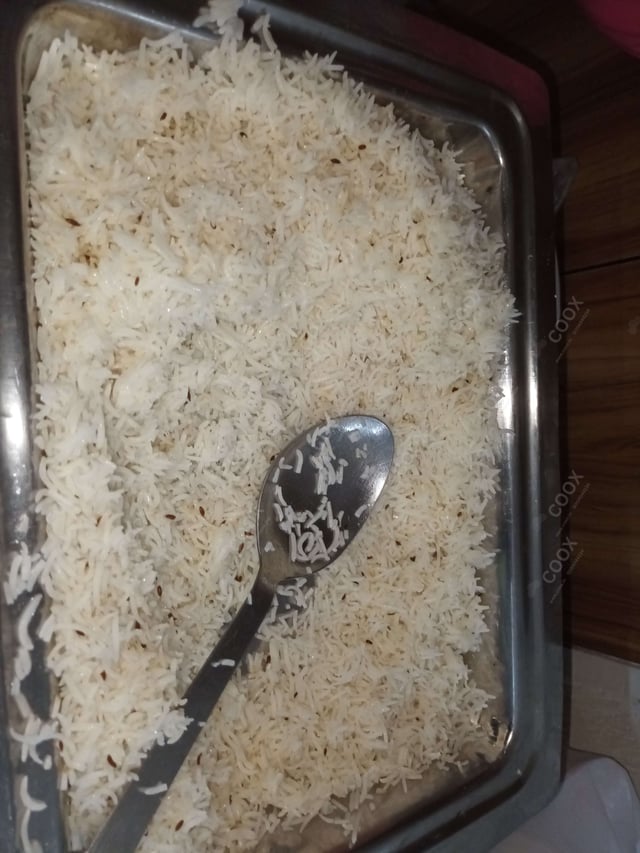 Delicious Jeera Rice prepared by COOX