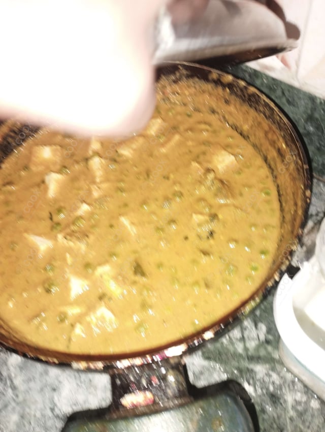 Delicious Matar Paneer prepared by COOX