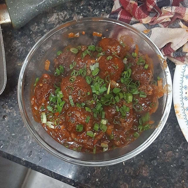 Delicious Veg Manchurian (Dry) prepared by COOX