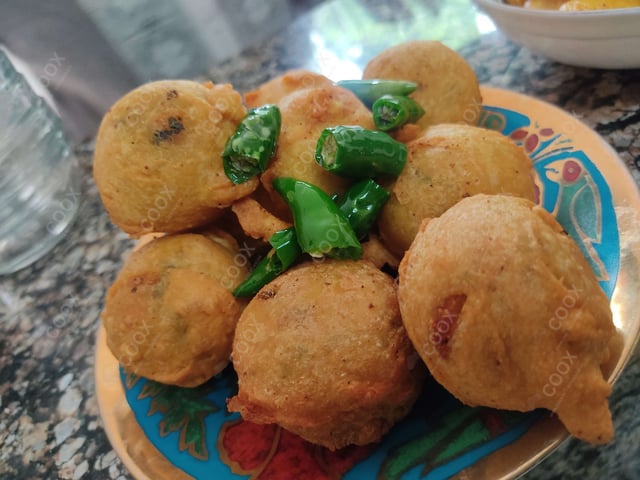 Delicious Aloo Bonda prepared by COOX