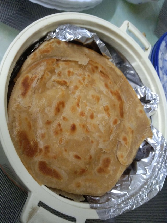 Delicious Lachha Parathas prepared by COOX