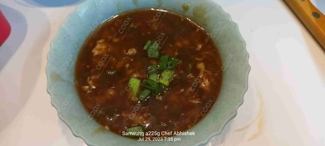 Delicious Chicken Hot & Sour Soup prepared by COOX