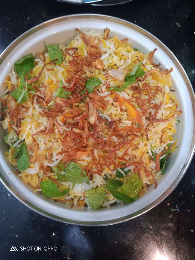 Delicious Veg Biryani prepared by COOX