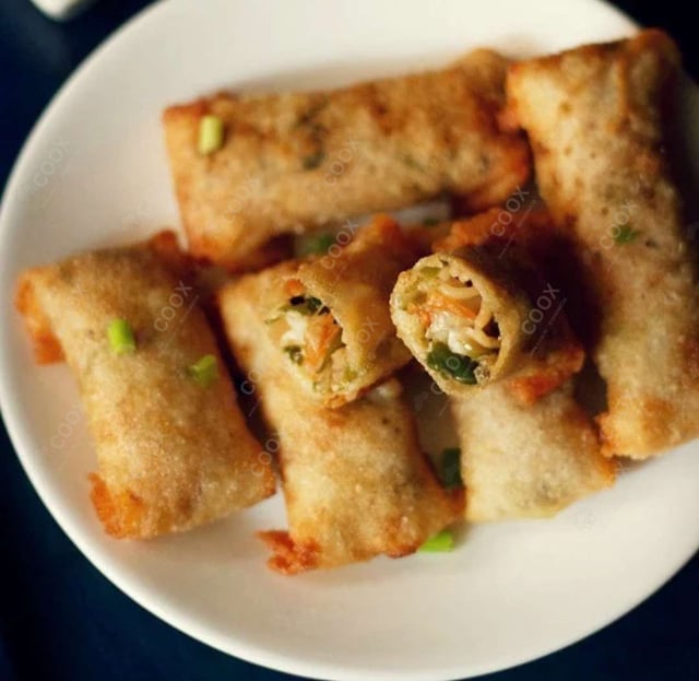 Delicious Veg Spring Rolls prepared by COOX