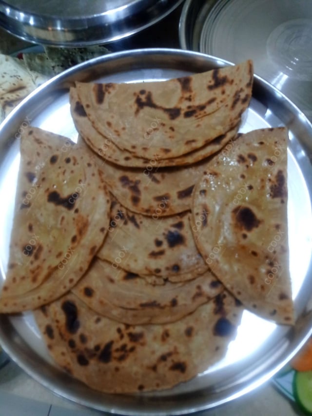 Delicious Lachha Parathas prepared by COOX