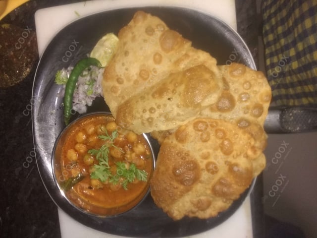 Delicious Chana Bhatura prepared by COOX