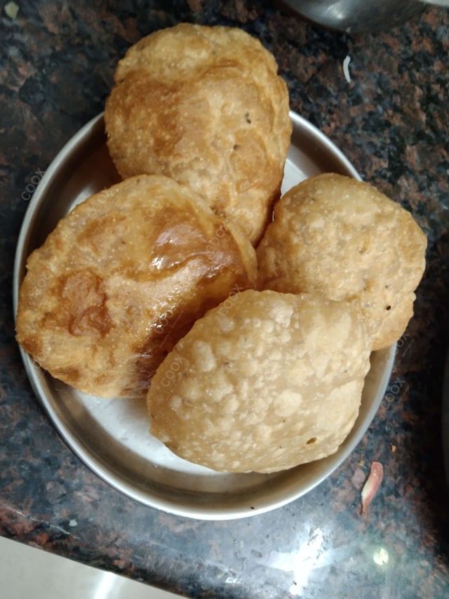 Delicious Pooris & Bedmis prepared by COOX