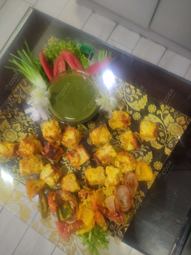 Delicious Paneer Tikka prepared by COOX