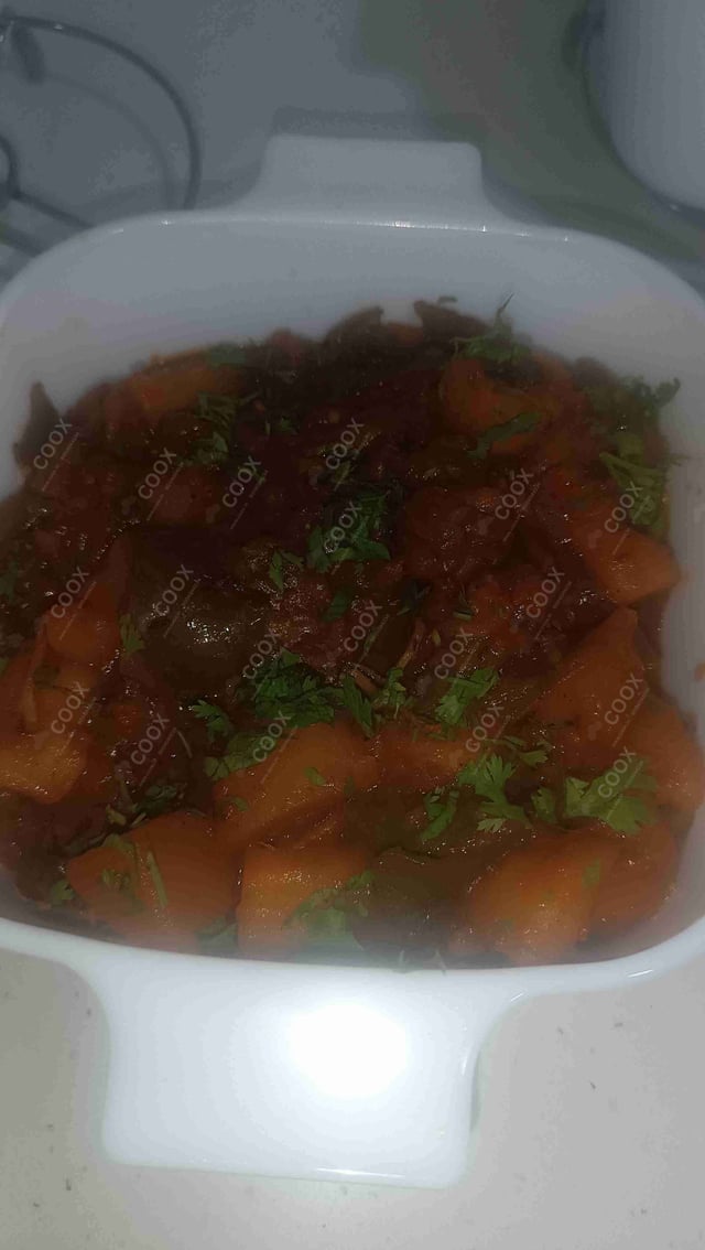 Delicious Aloo Shimla Mirch prepared by COOX