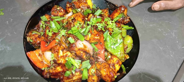 Delicious Chilli Paneer (Dry) prepared by COOX