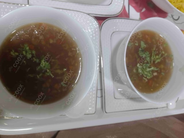 Delicious Vegetable Manchow Soup prepared by COOX